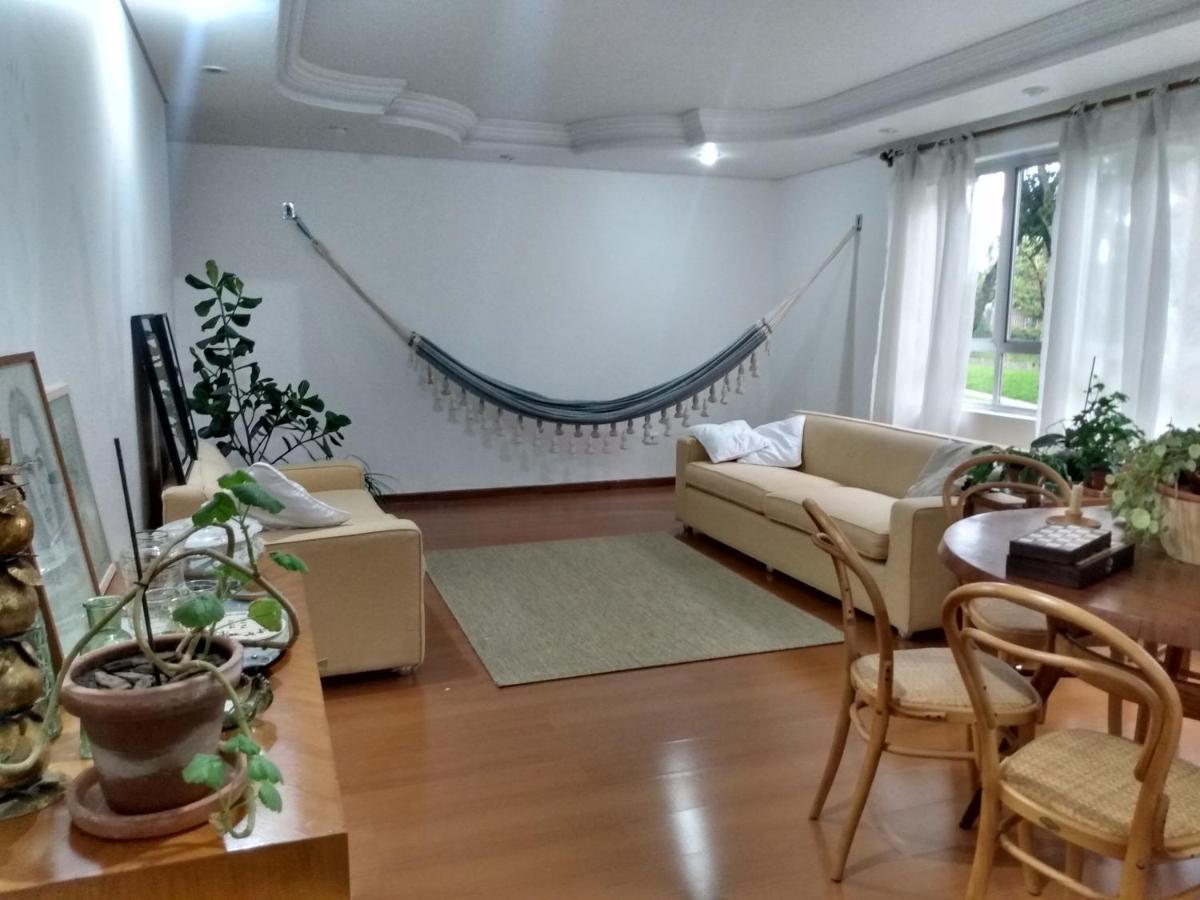 Quarto suíte confortável Hospedagem domiciliar Curitiba